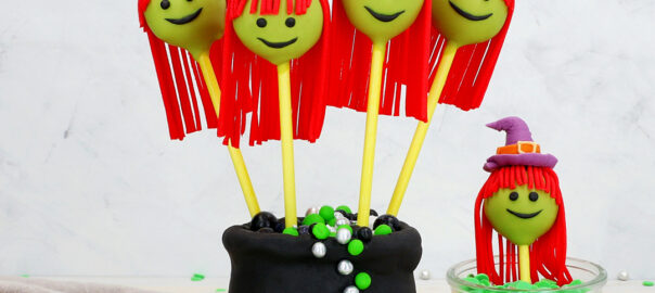 Das Bild zeigt Cake Pops die als Hexenköpfe verziert sind