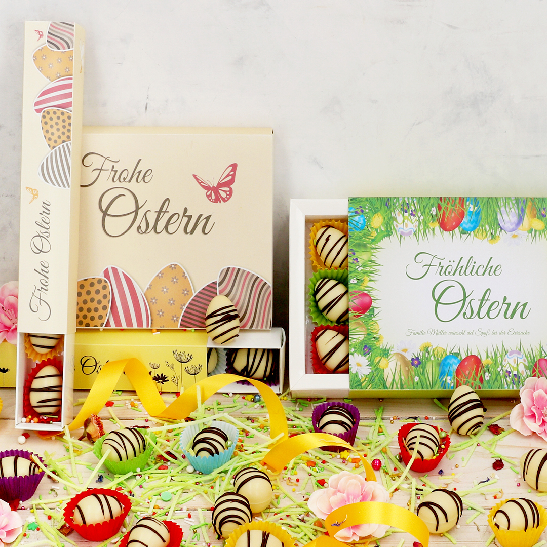 Das Bild zeigt Pralinen mit Pralinenverpackungen mit Ostermotiv