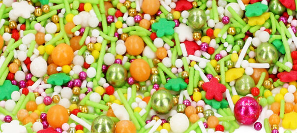 Das Bild zeigt eine Sprinkles-Mischung in grün, rot und orange